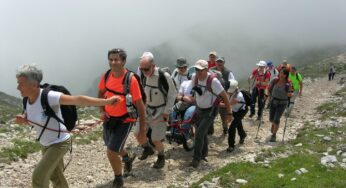 “Insieme si può”, anche in carrozzella. La storia di Luca e della sua scalata al Redentore