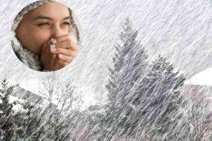 bufera di neve e donna che ha freddo